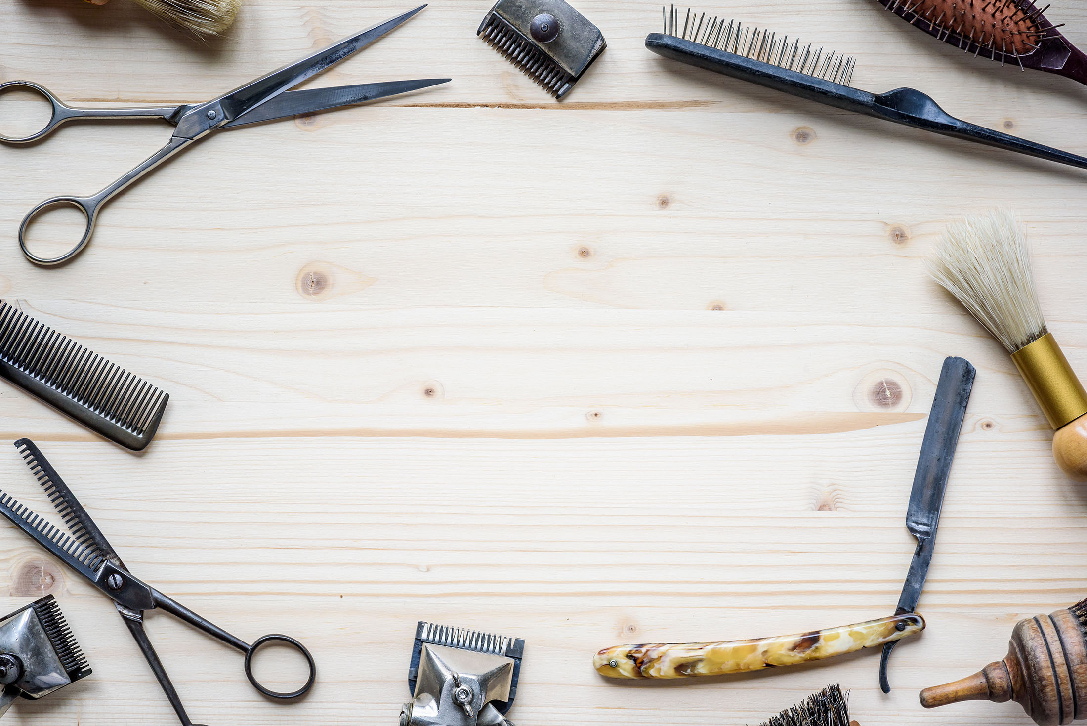 Vintage barbershop tools representing the premium quality of Fwresh barber services in Boston